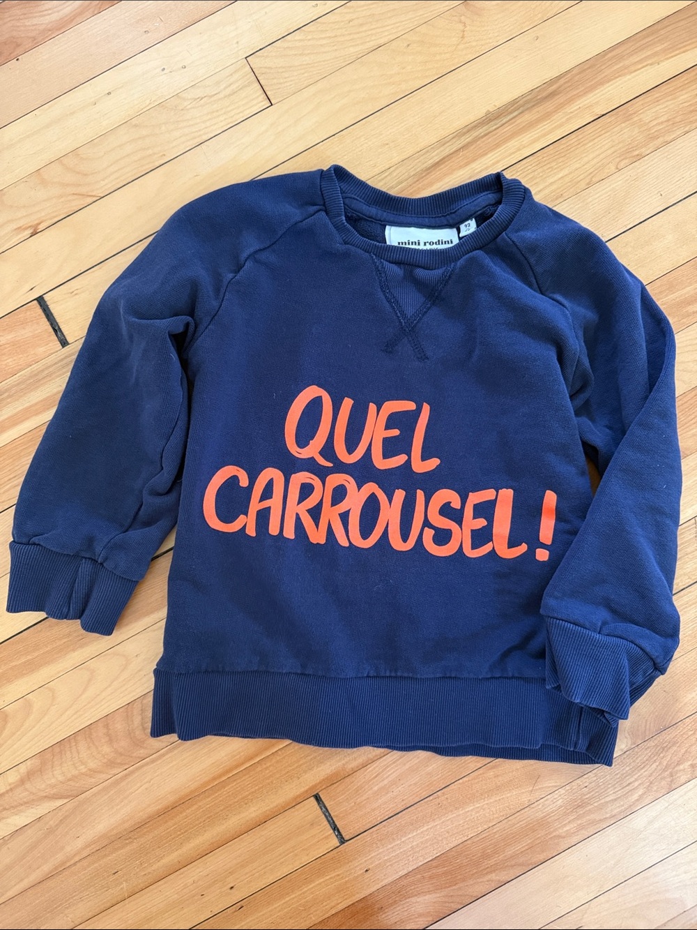 Mini Rodini Navy Sweatshirt with Orange "Quel Carrousel!" Print